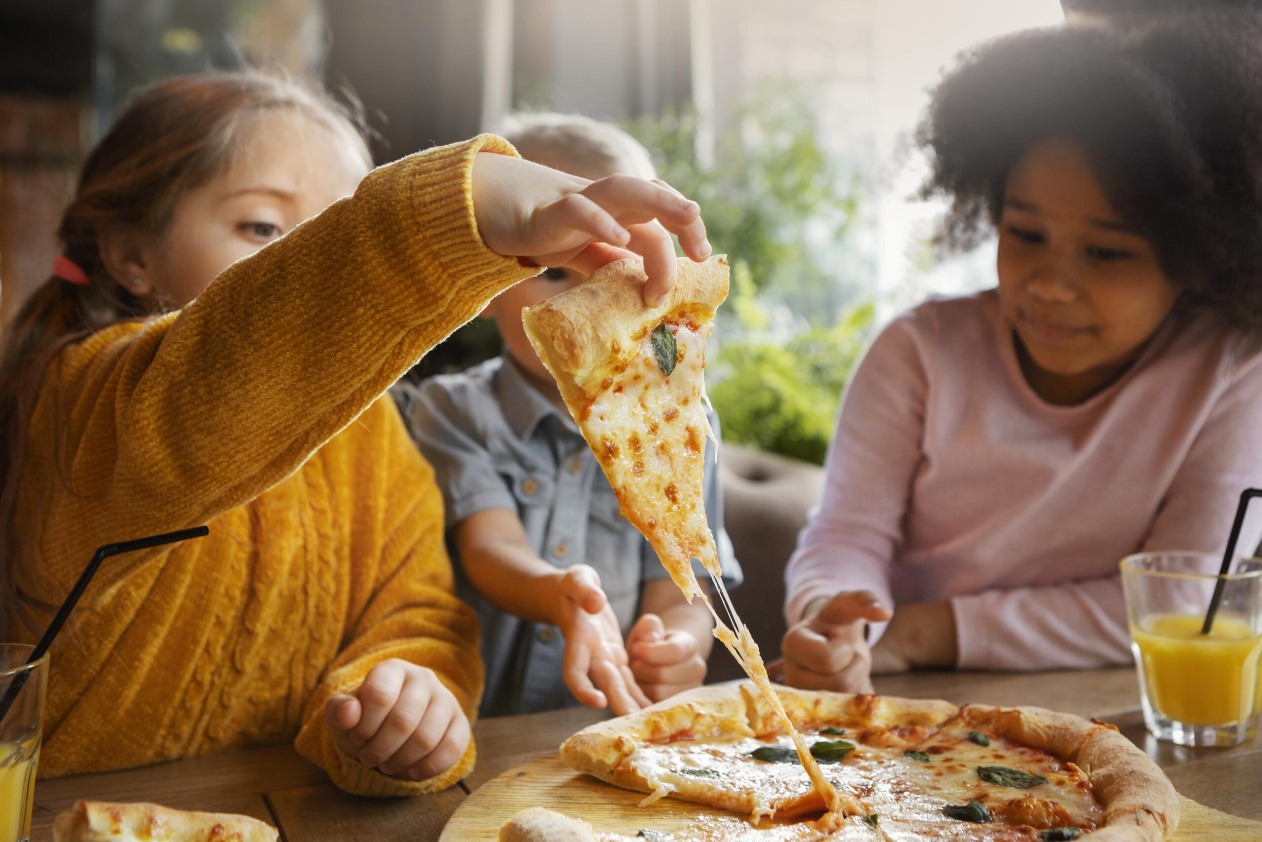 What are the best pizza varieties to try for a family dinner?